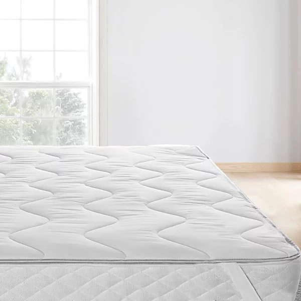 elastic corners to secure mattress topper in place